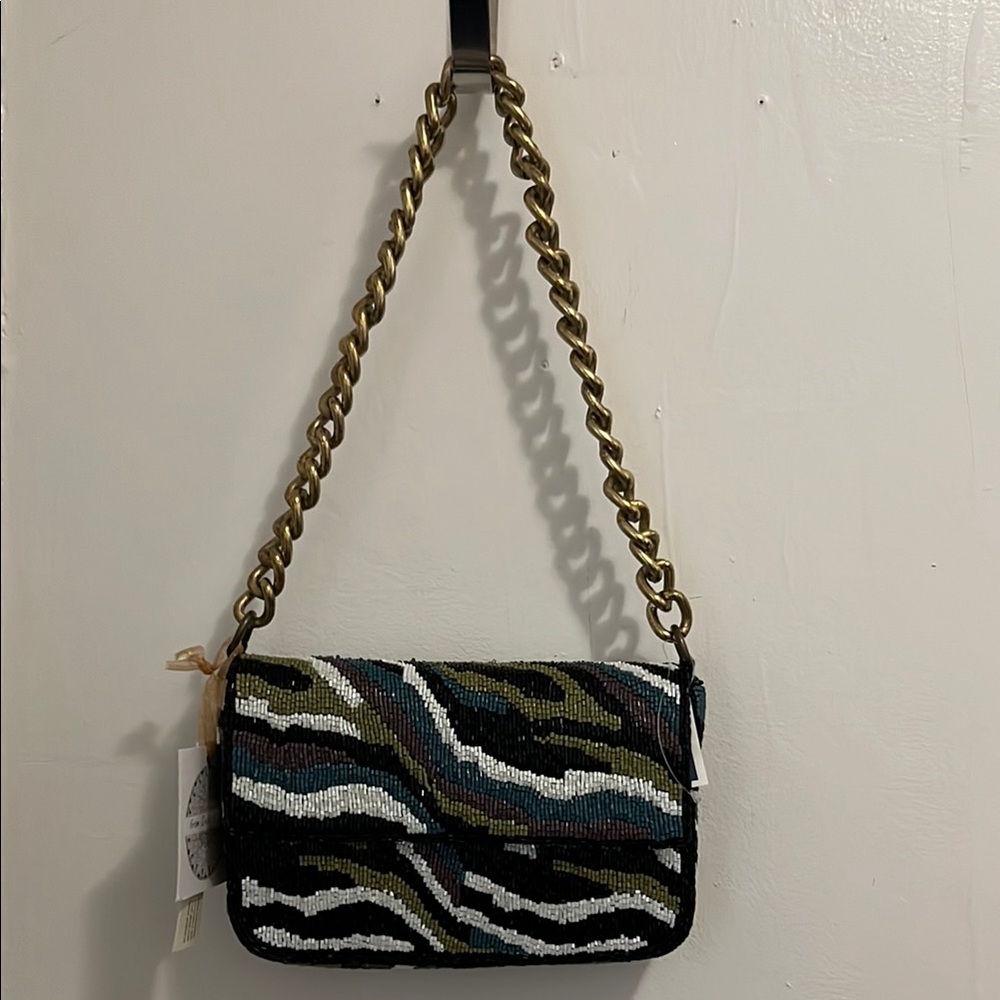 Multicolored beaded bag with thick gold chain strap